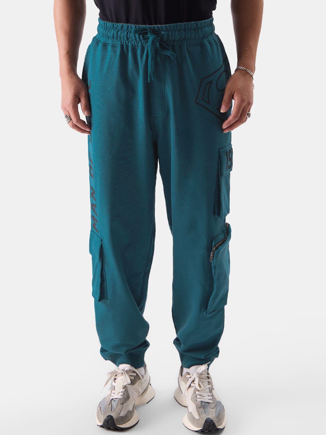 the souled store men teal relaxed superman printed travel joggers trousers