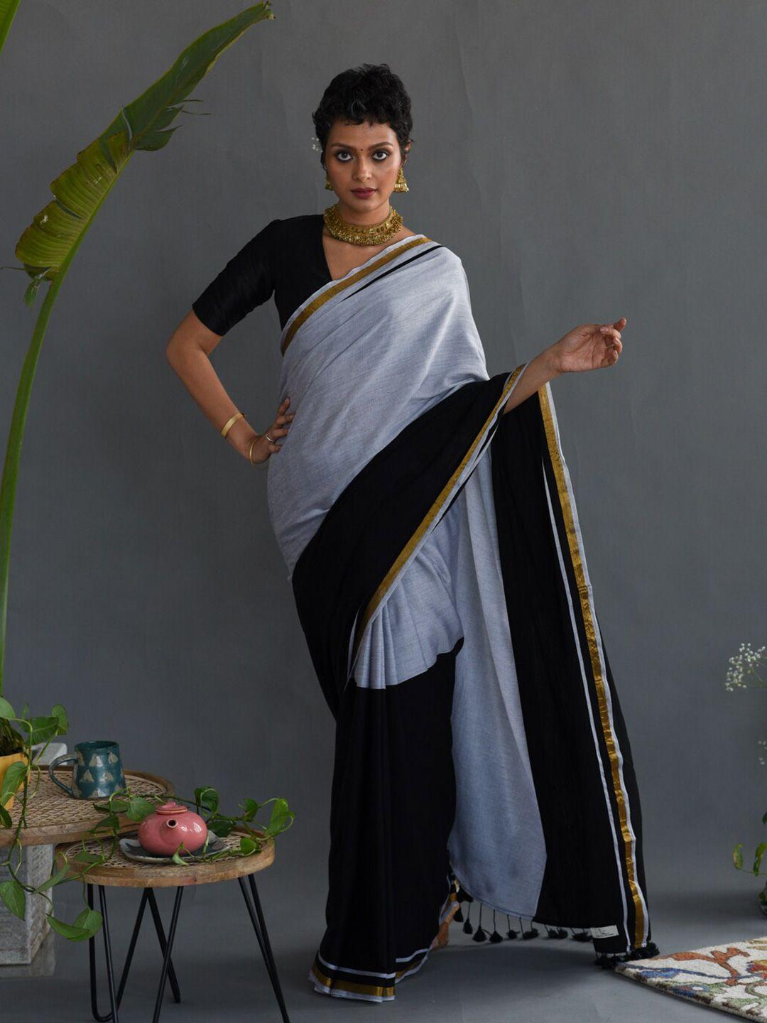 suta black & blue colourblocked zari saree