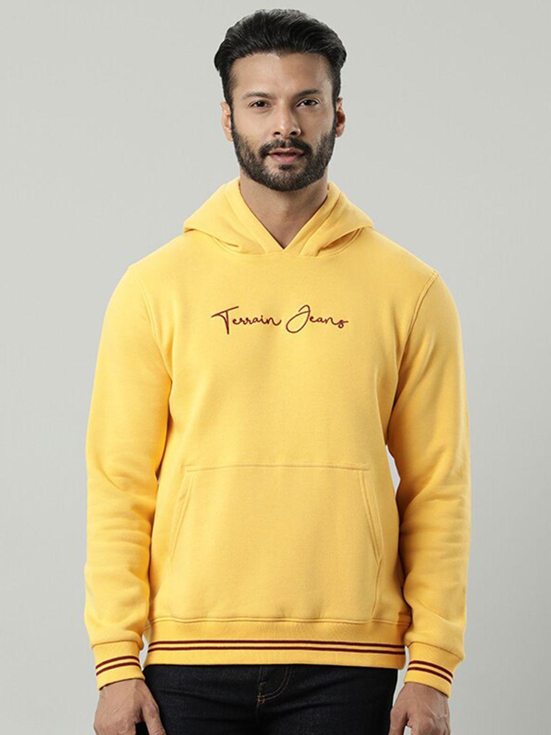 indian terrain men yellow sweatshirt