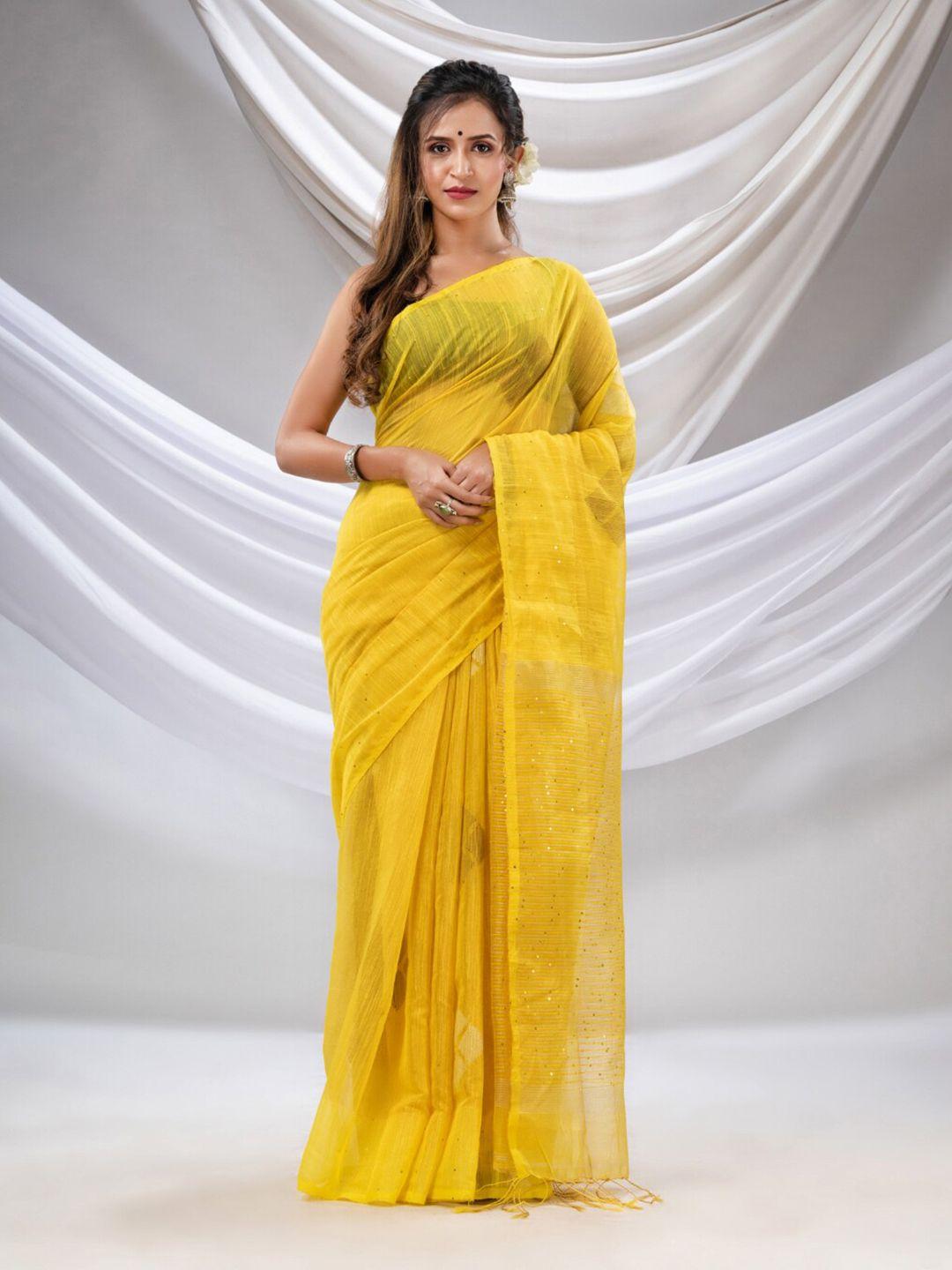 charukriti sequinned embellished tissue saree