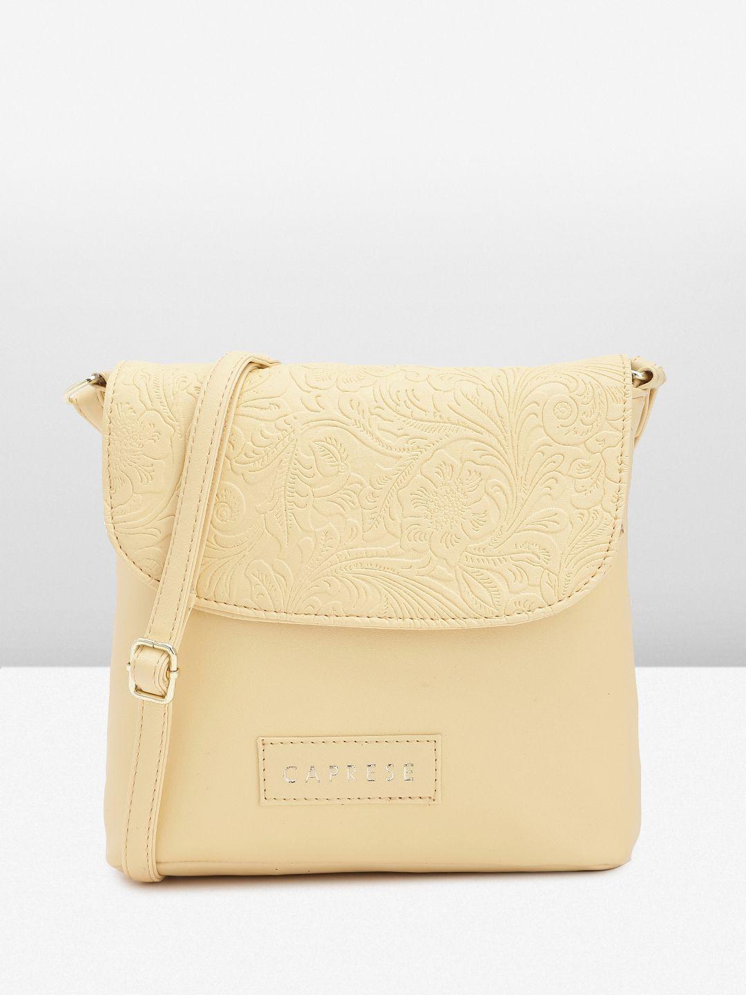 caprese yellow floral textured structured sling bag