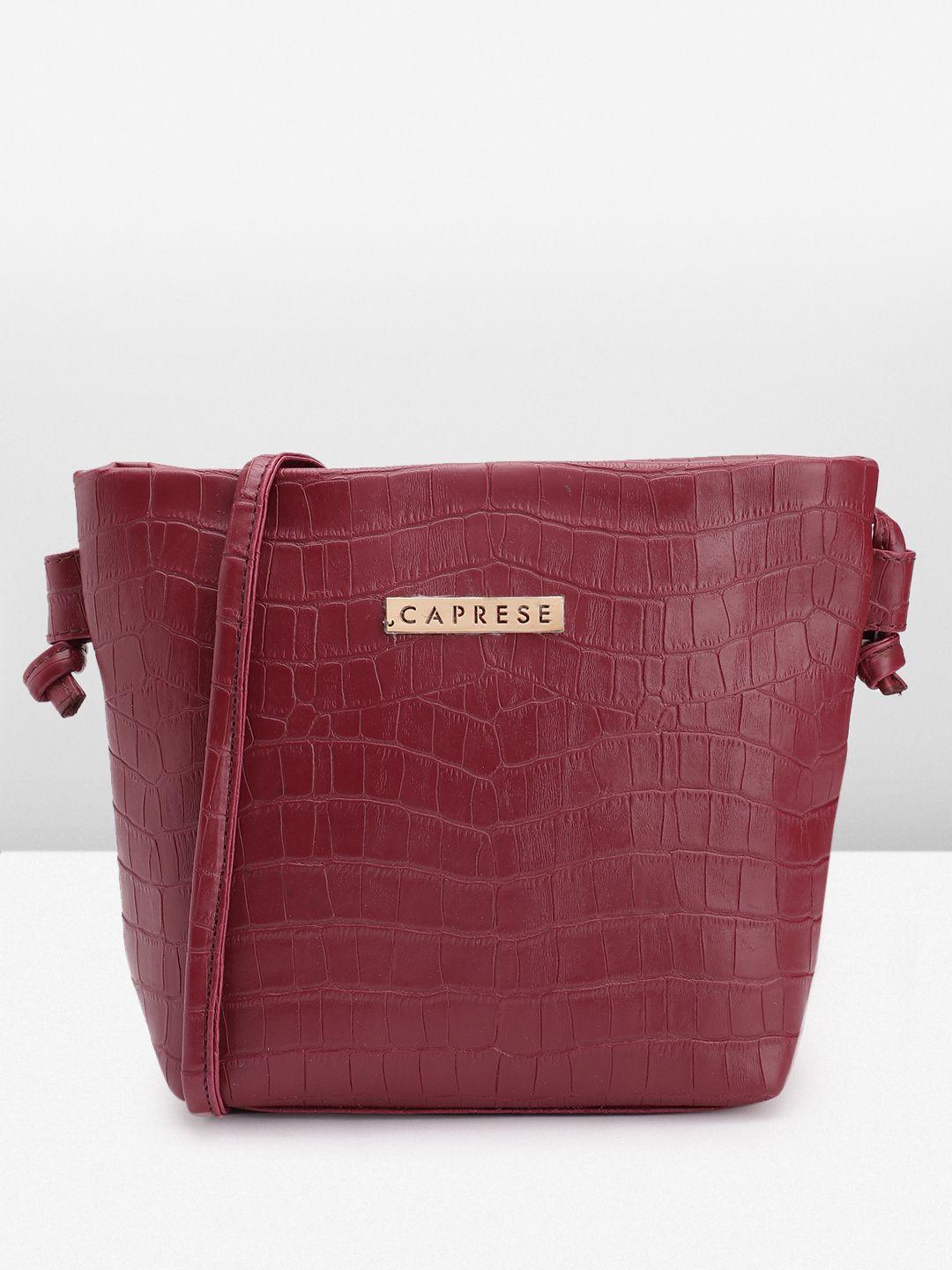 caprese croc textured structured sling bag