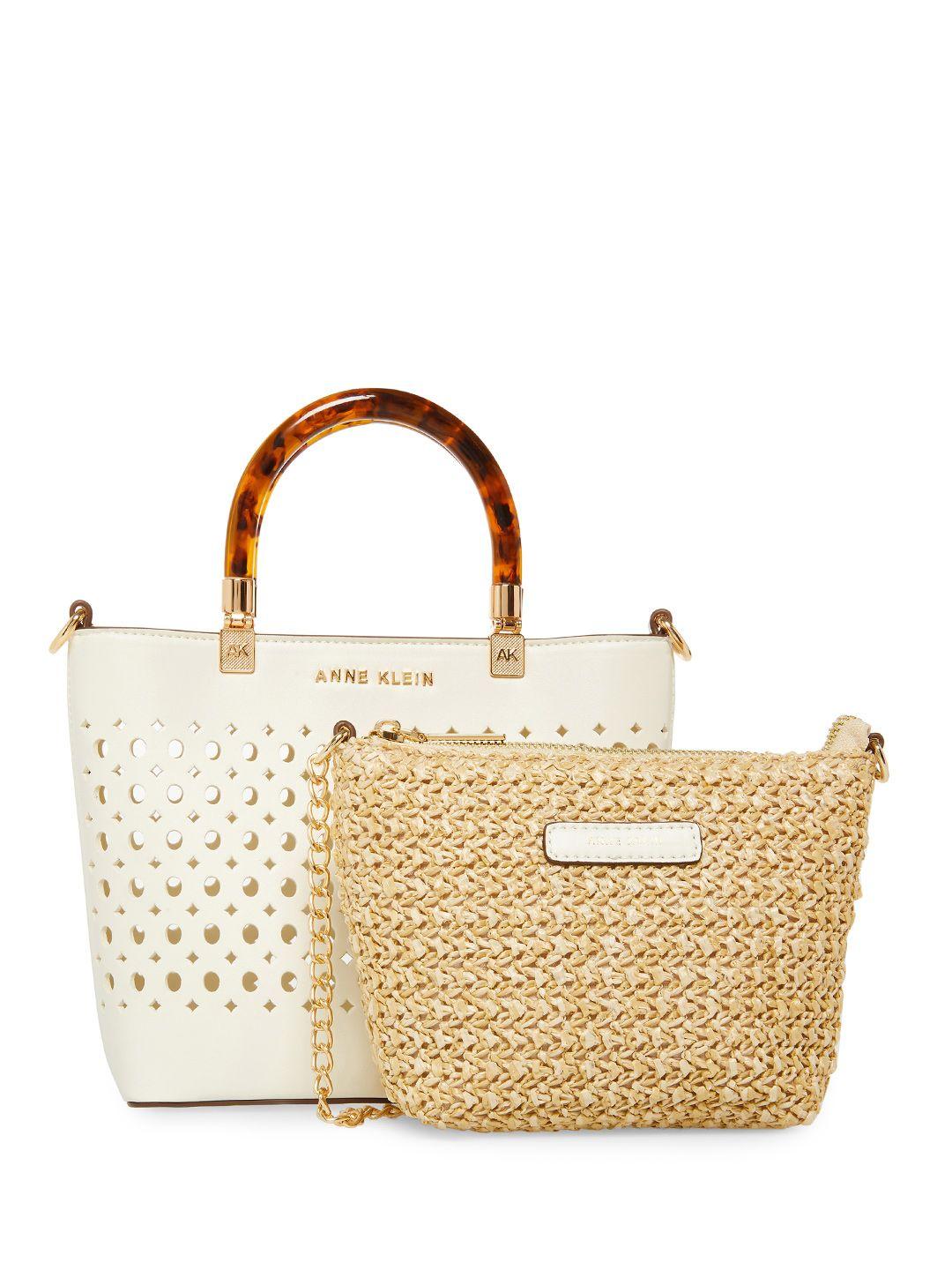 anne klein laser cut detail bucket handheld bag with woven design pouch