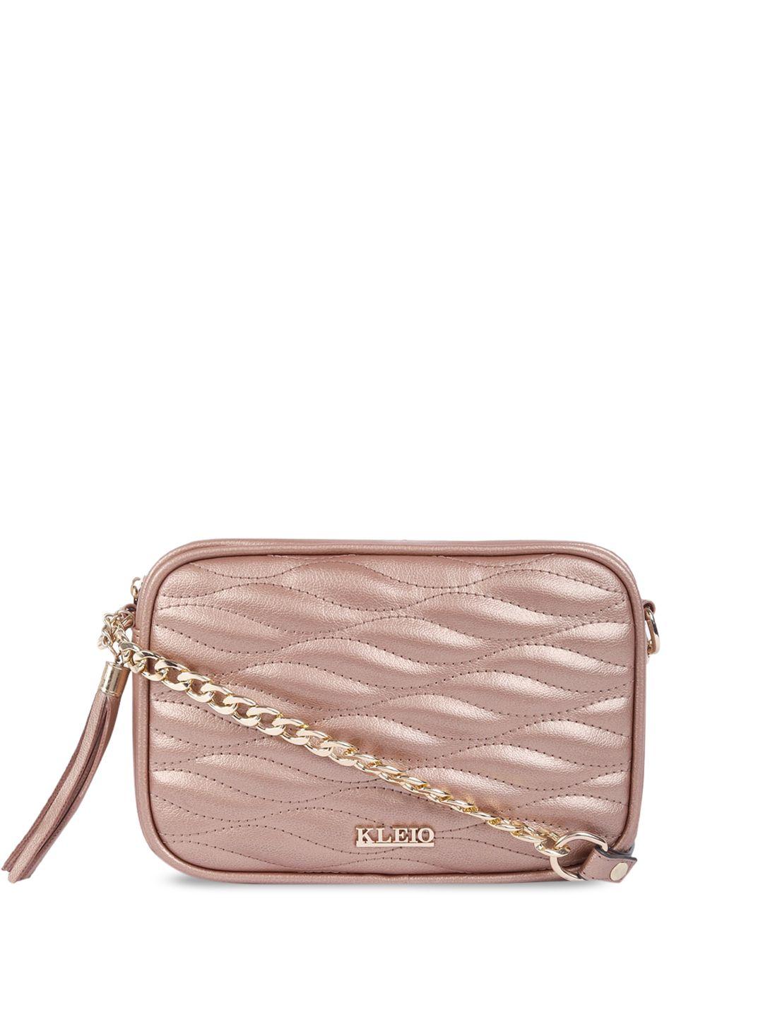 kleio structured sling bag with quilted