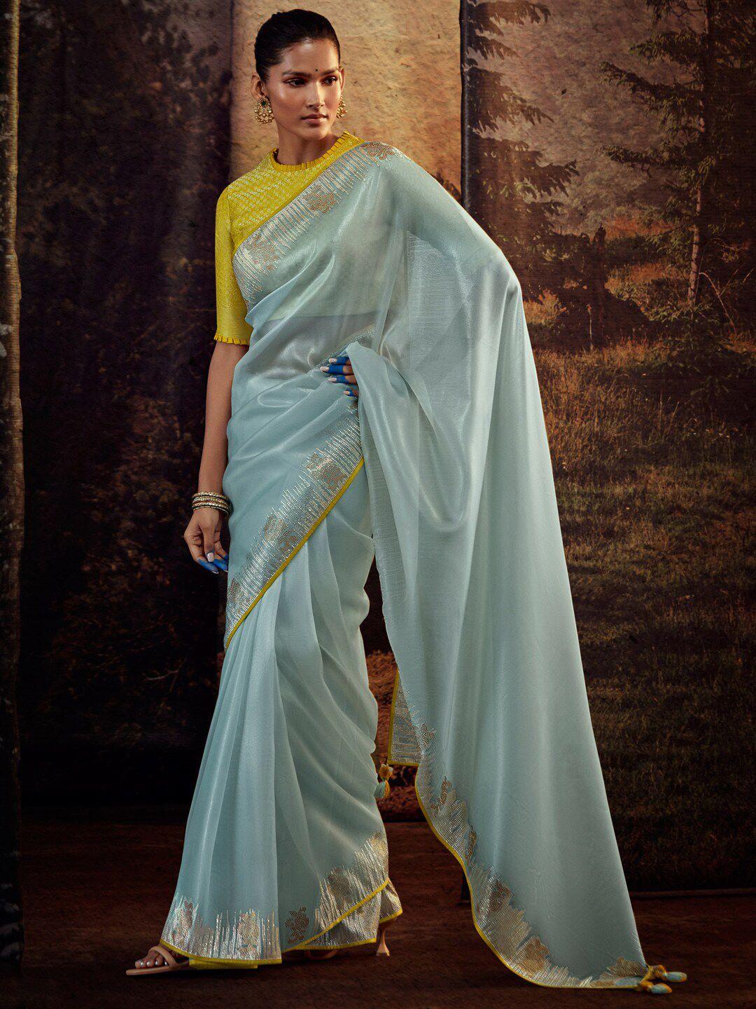 mitera blue beads and stones tissue saree