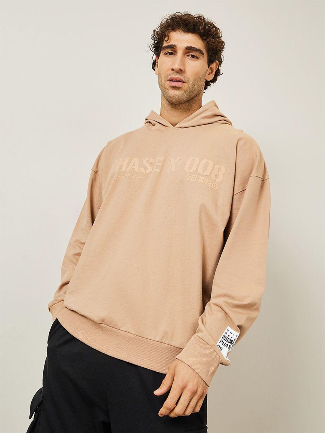 styli beige typography printed hooded pure cotton oversized sweatshirt