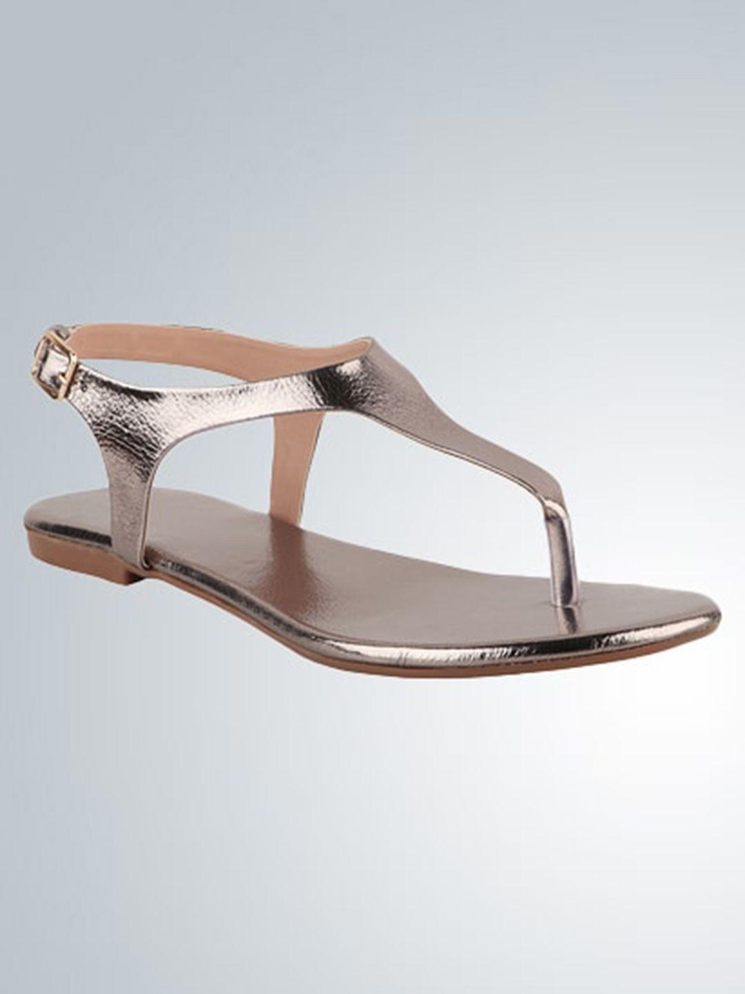 the white pole t-strap flats with buckle closure