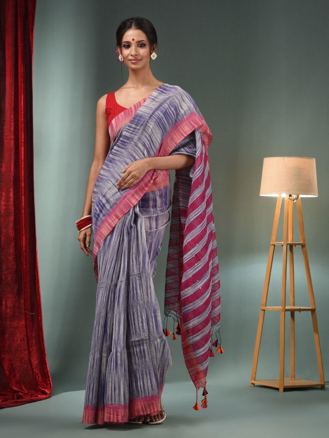 charukriti absatrct woven design sequinned saree