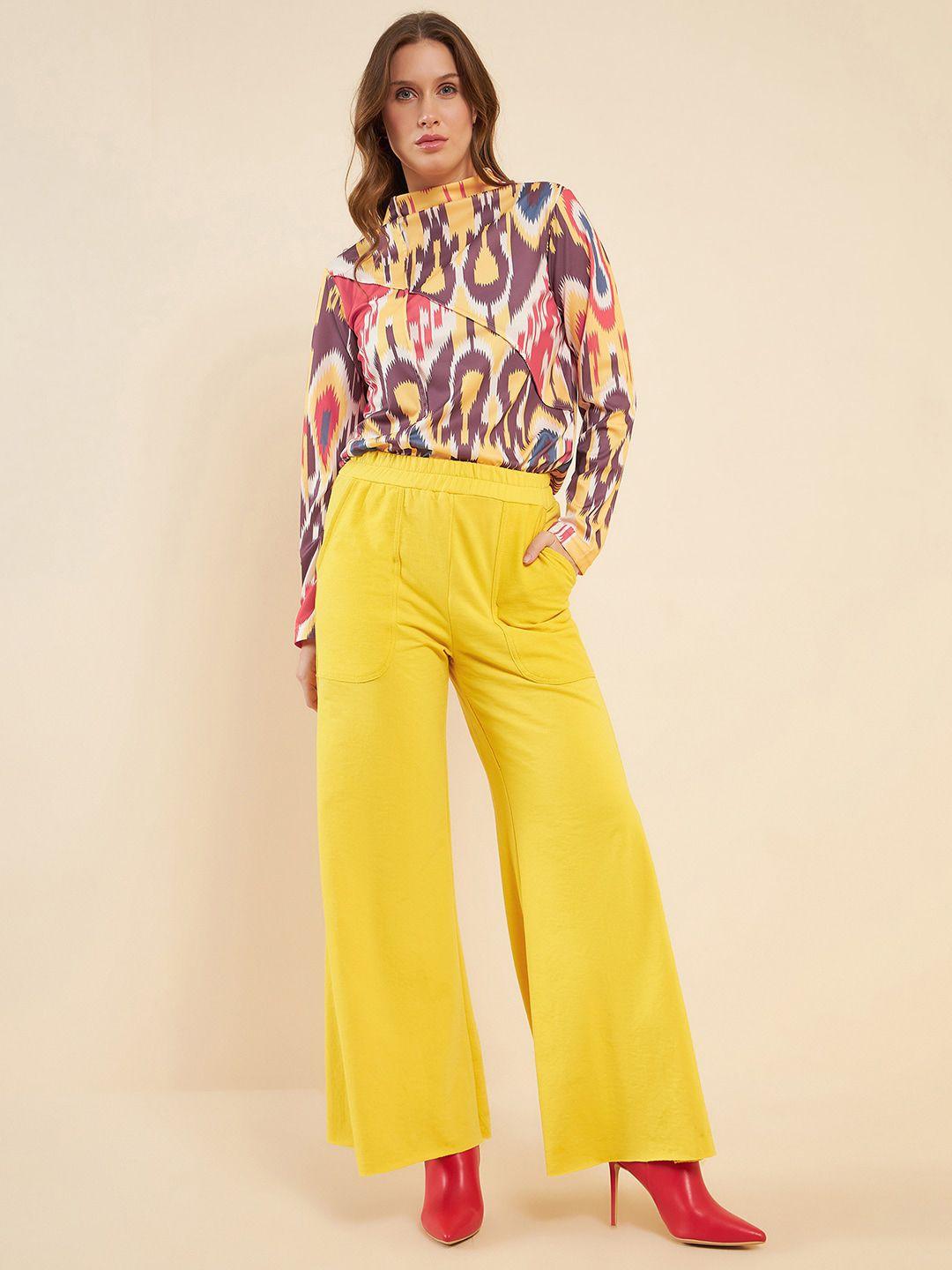 antheaa printed high neck top & flared trousers