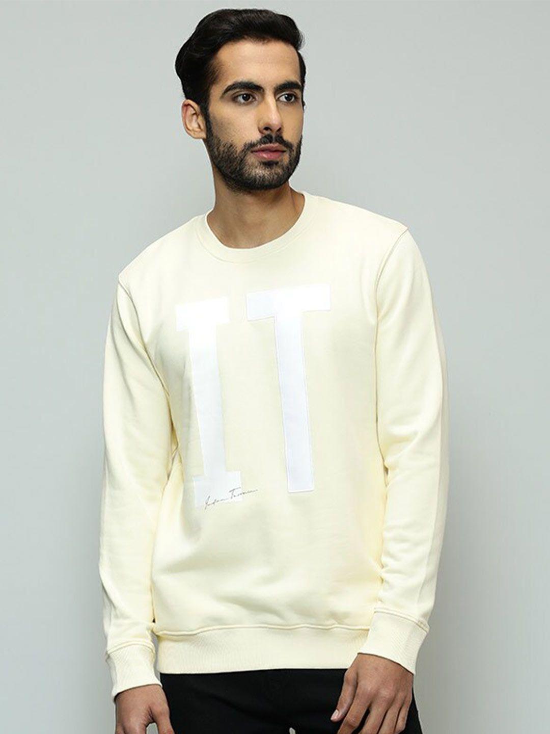 indian terrain men yellow sweatshirt