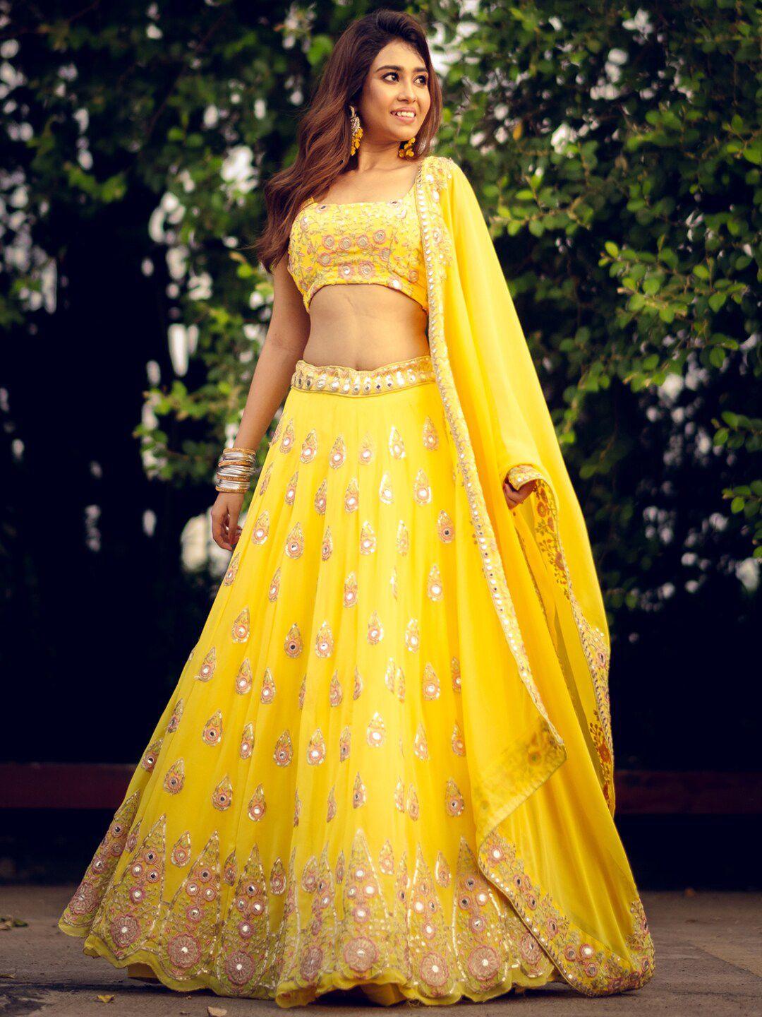 tikodi yellow embroidered mirror work semi-stitched lehenga & unstitched blouse with dupatta