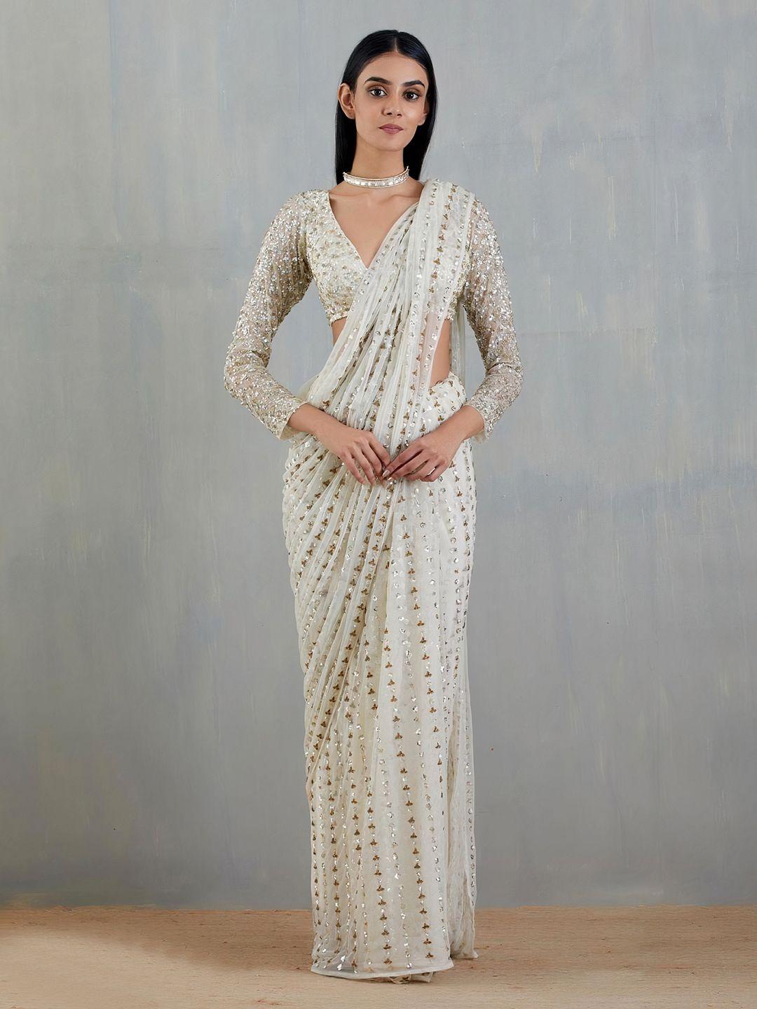 angroop white & gold-toned striped sequinned net saree