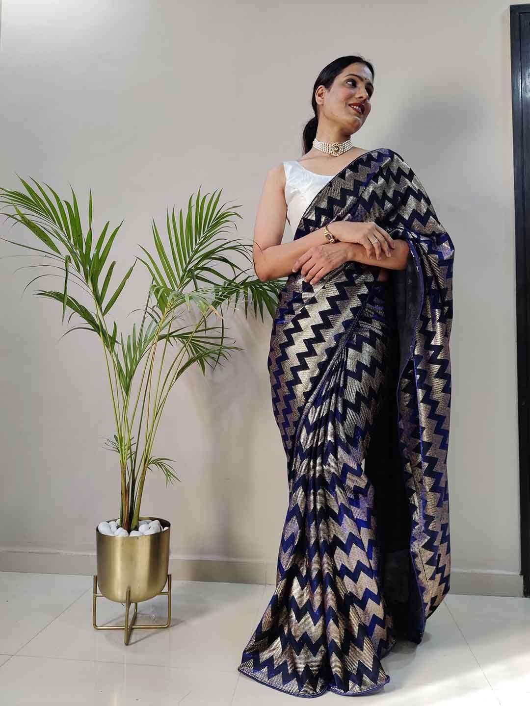 teeya creation woven design zari net saree