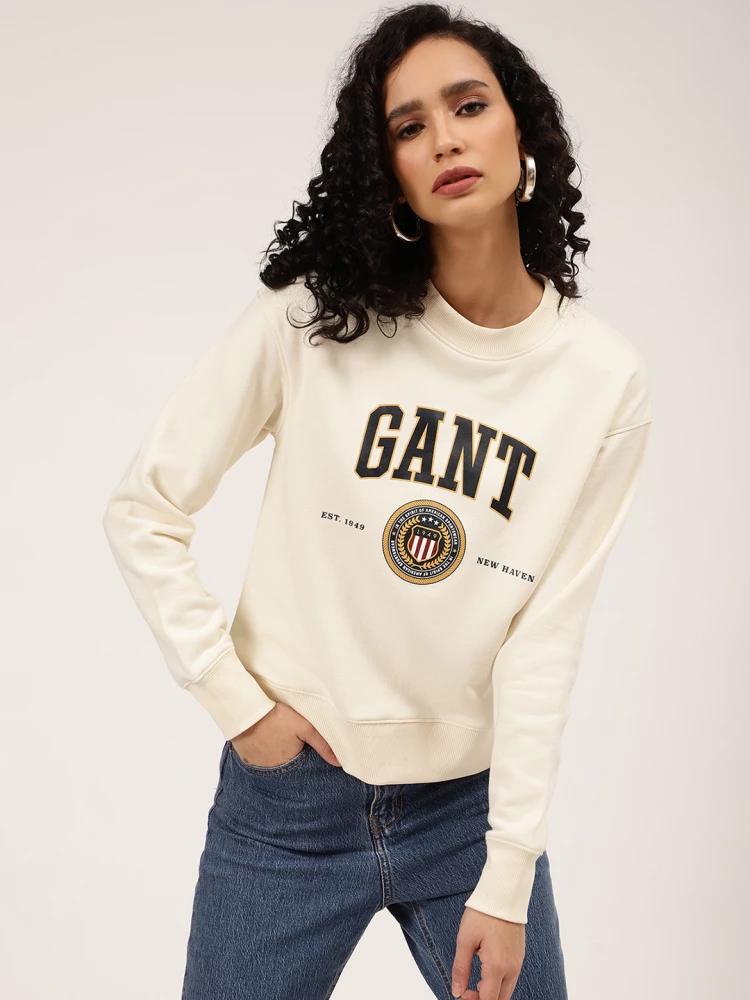 cream solid round neck sweatshirt