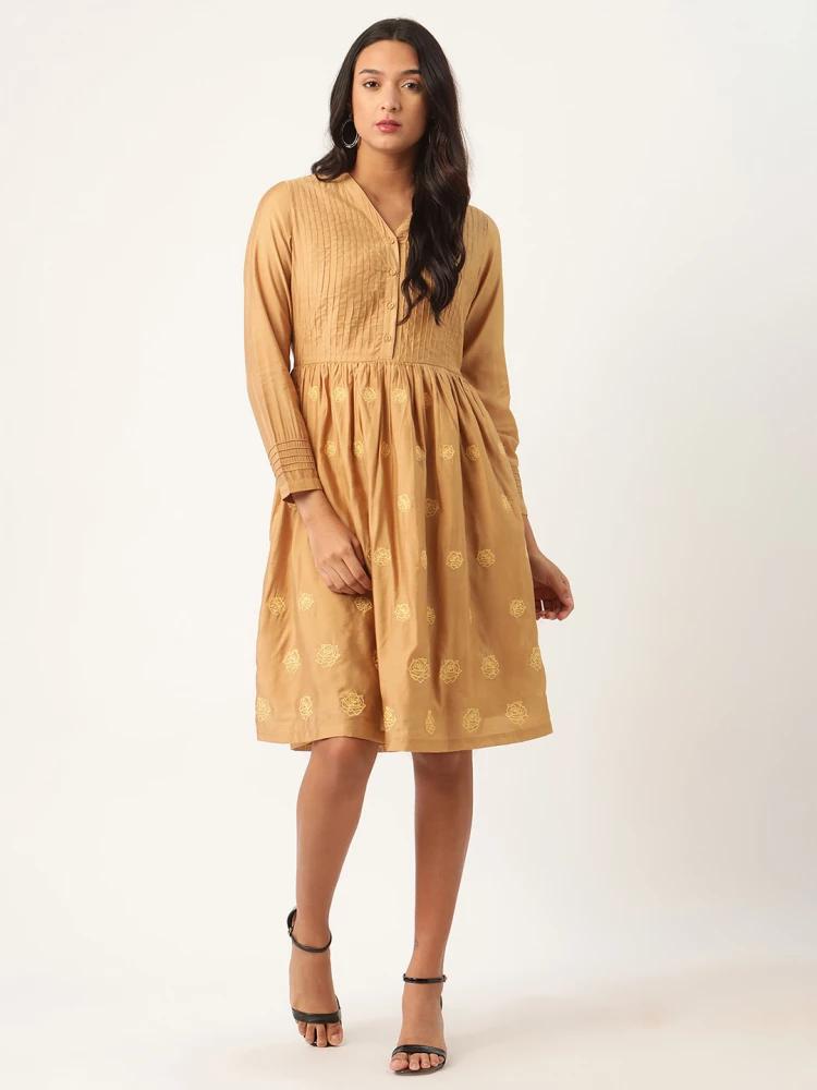 beige embroidered v neck dress