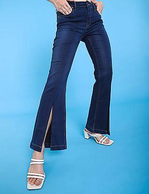 blue mid rise dark wash split hem flared jeans