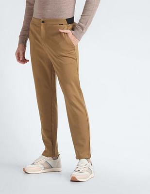 solid tapered fit trousers