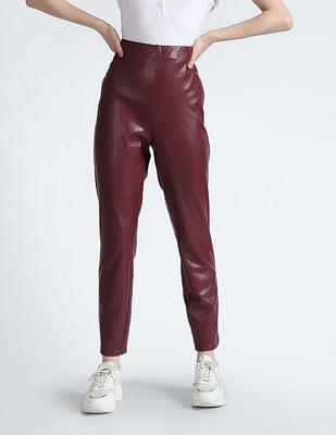 faux leather slim fit solid trousers