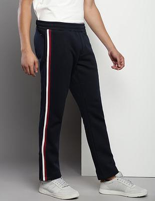 brand tape solid track pants