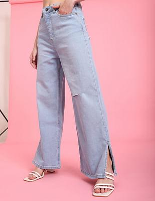 light blue high rise distressed split hem wide leg jeans