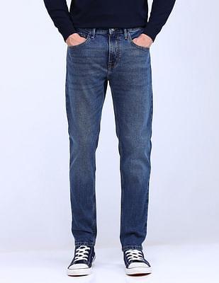 slash slim tapered stone wash jeans