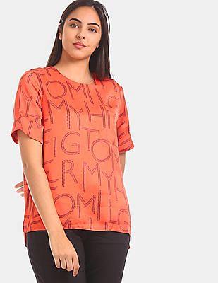 women orange brand printed woven top