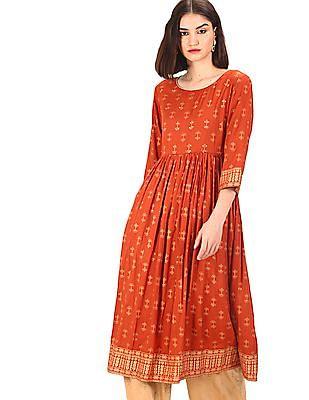 women rust round neck printed flared kurta