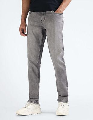 slim tapered fit mid rise jeans