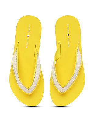 women v-strap brand print flip flops