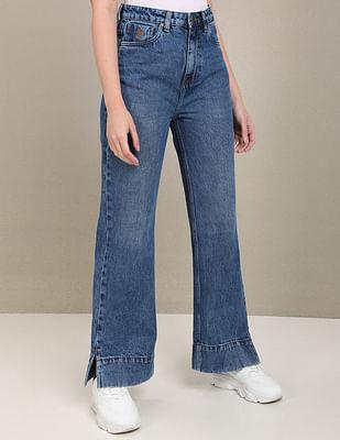 acid wash vented hem flared jeans