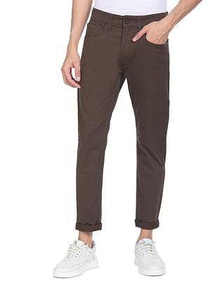 men brown mid rise solid casual trousers