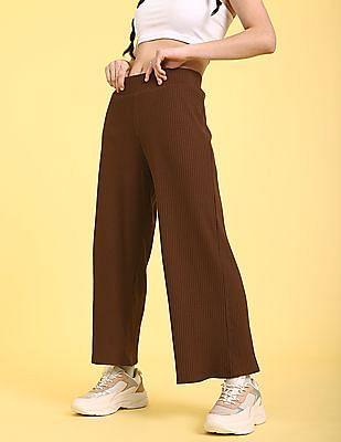 brown elasticized waist flared solid knit trousers