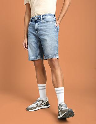 mid rise stone wash denim shorts