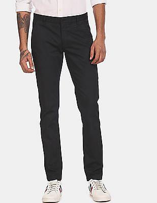 men black mid rise patterned casual trousers