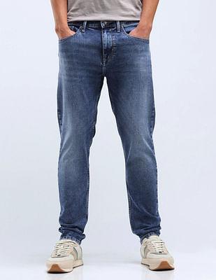 slash slim tapered stone wash jeans