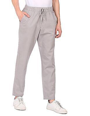 men grey mid rise drawstring waist solid casual trousers