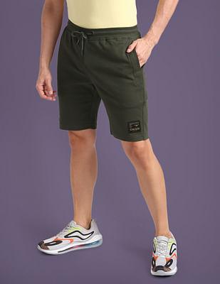 solid cotton blend mid rise shorts