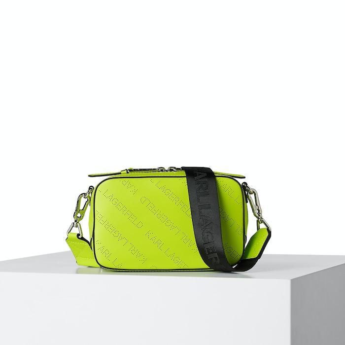 women lime punched logo camera bag