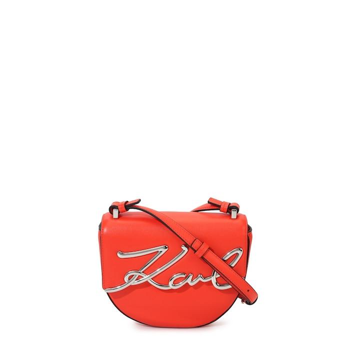 women red k/signature leather saddle crossbody bag