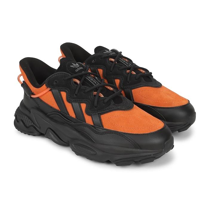 men orange ozweego shoes