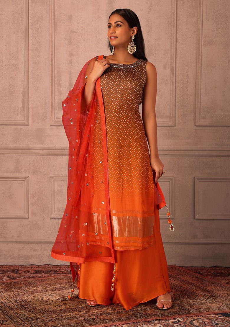 rust orange sharara set with straight embroidered kurta and dupatta