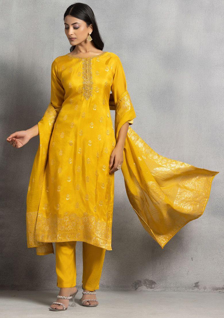 yellow hand embroidered silk kurta set with pants and brocade dupatta