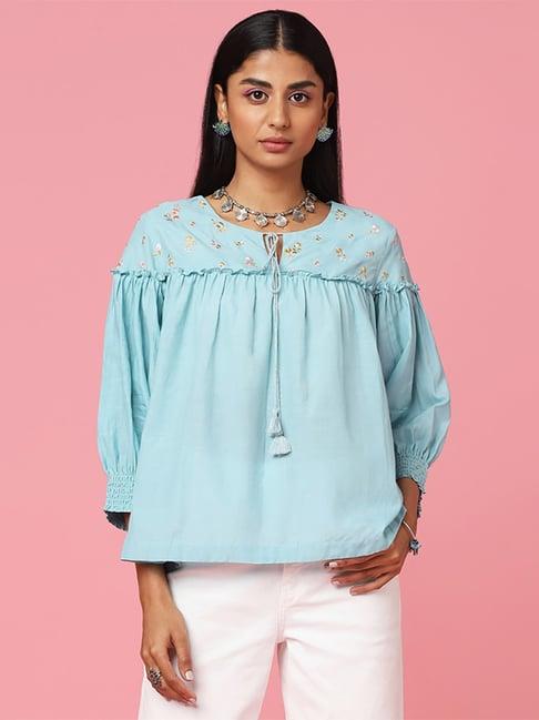 marigold lane blue embroidered top