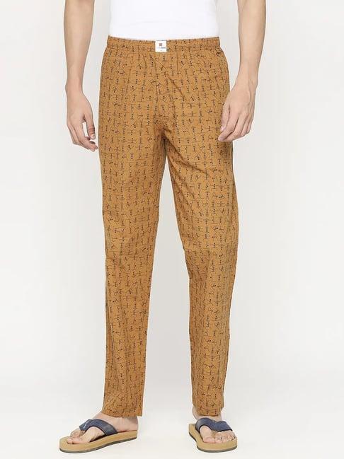 underjeans by spykar mustard regular fit printed trackpants