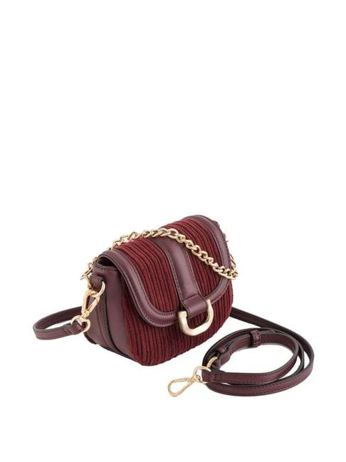 carpisa maroon textured mini sling handbag