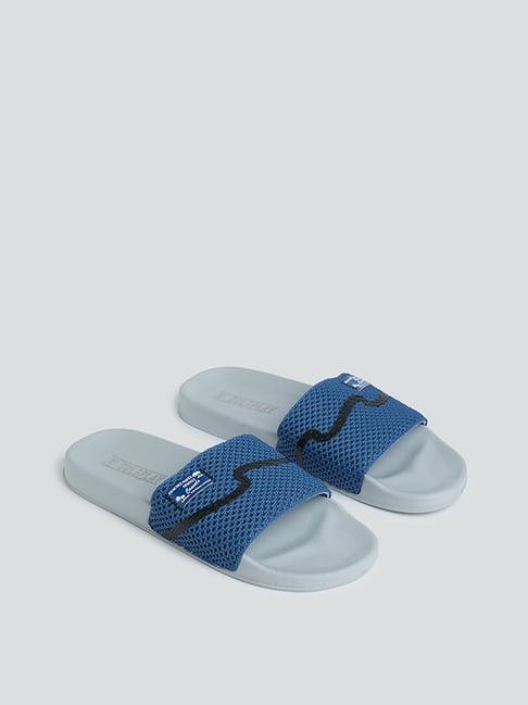 soleplay by westside indigo textured slides