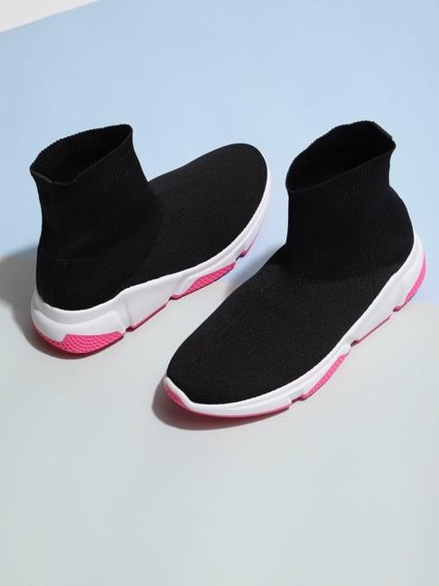 truffle collection women's black running shoes