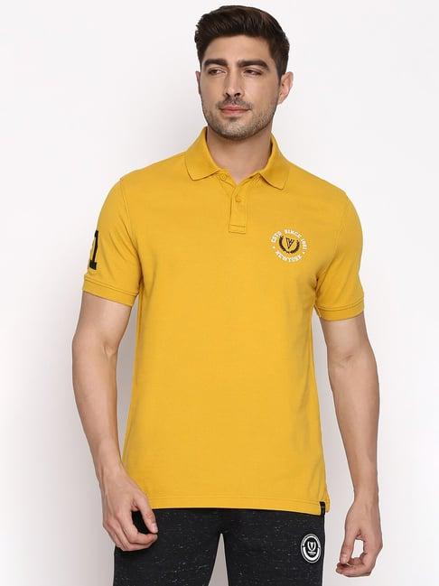 van heusen sport regular fit varsity inspired short sleeve solid polo t-shirt - mustard