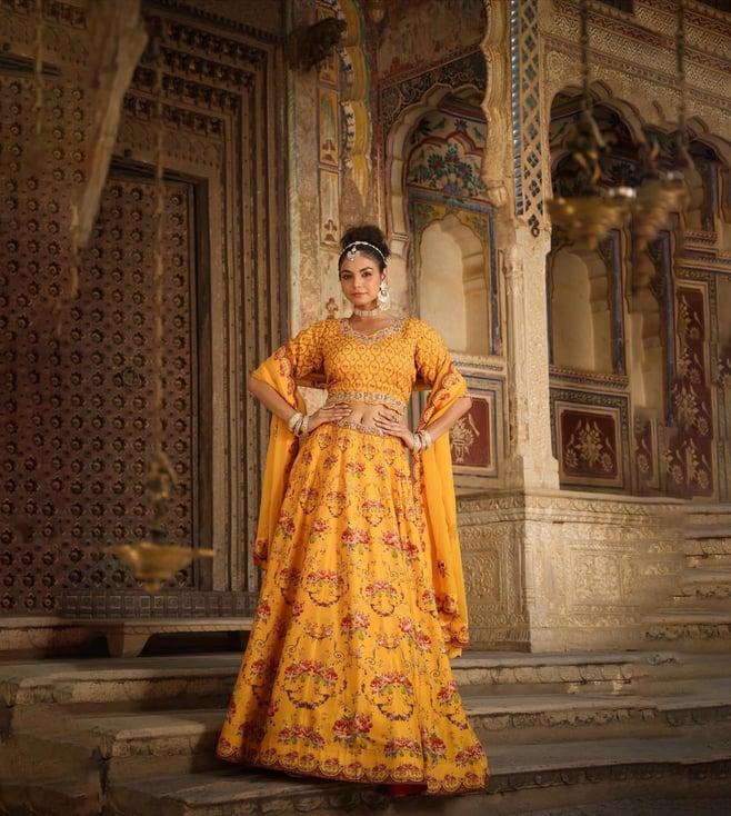 scakhi mustard raw silk floral print with embroidered lehenga with choli and dupatta