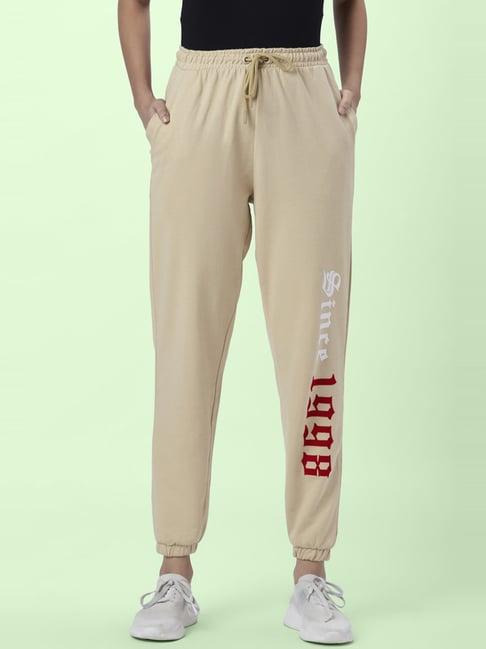 ajile by pantaloons beige cotton printed track pants